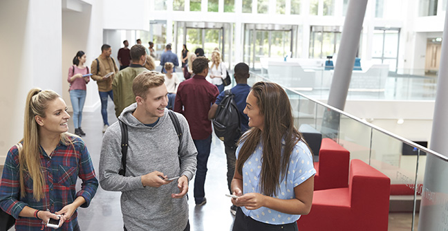 Students walking through lobby